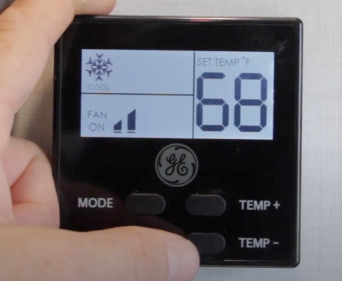 RV furnace thermostat being tested during a seasonal check-up